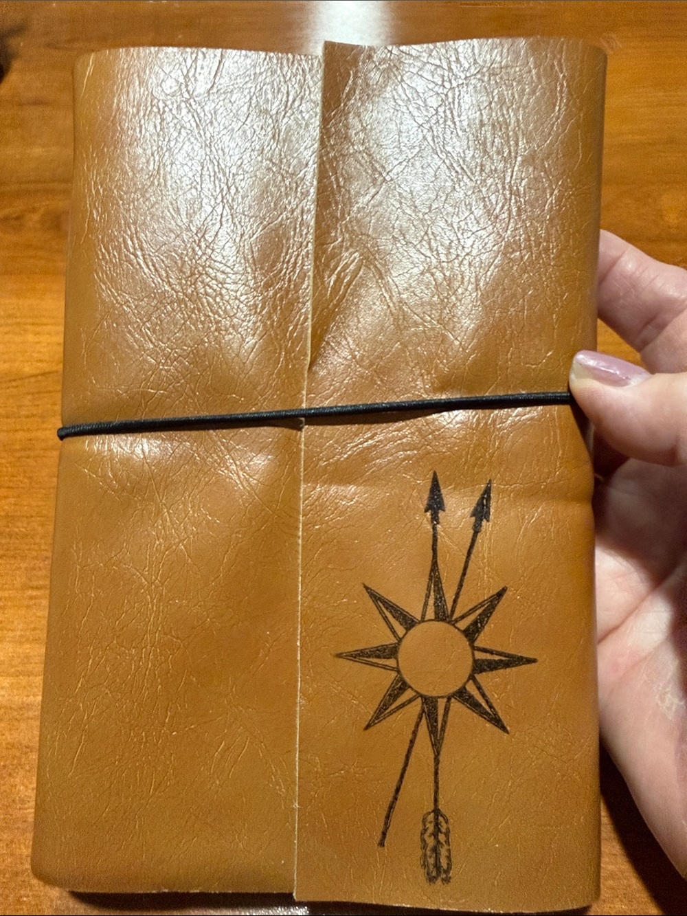 Tan Faux Leather “True North” Journal.
